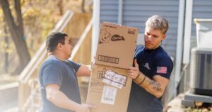 workers moving boxes