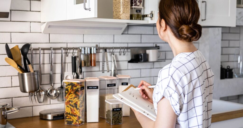 woman doing kitchen inventory